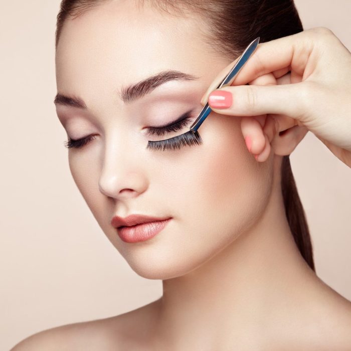 makeup-artist-glues-eyelashes.jpg